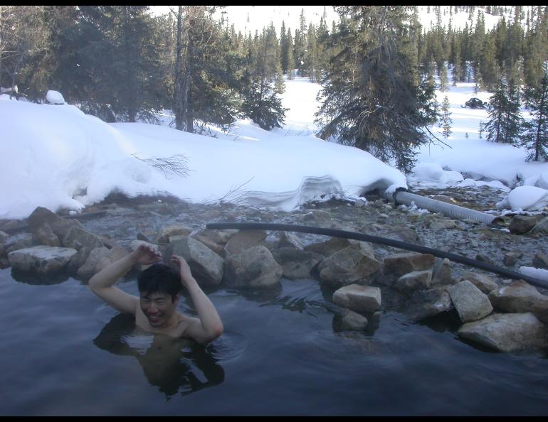 Tohru Saito soaks in Kwiniuk Hot Springs, located on the Seward Peninsula not far from the village of Elim. Photo by Ned Rozell.